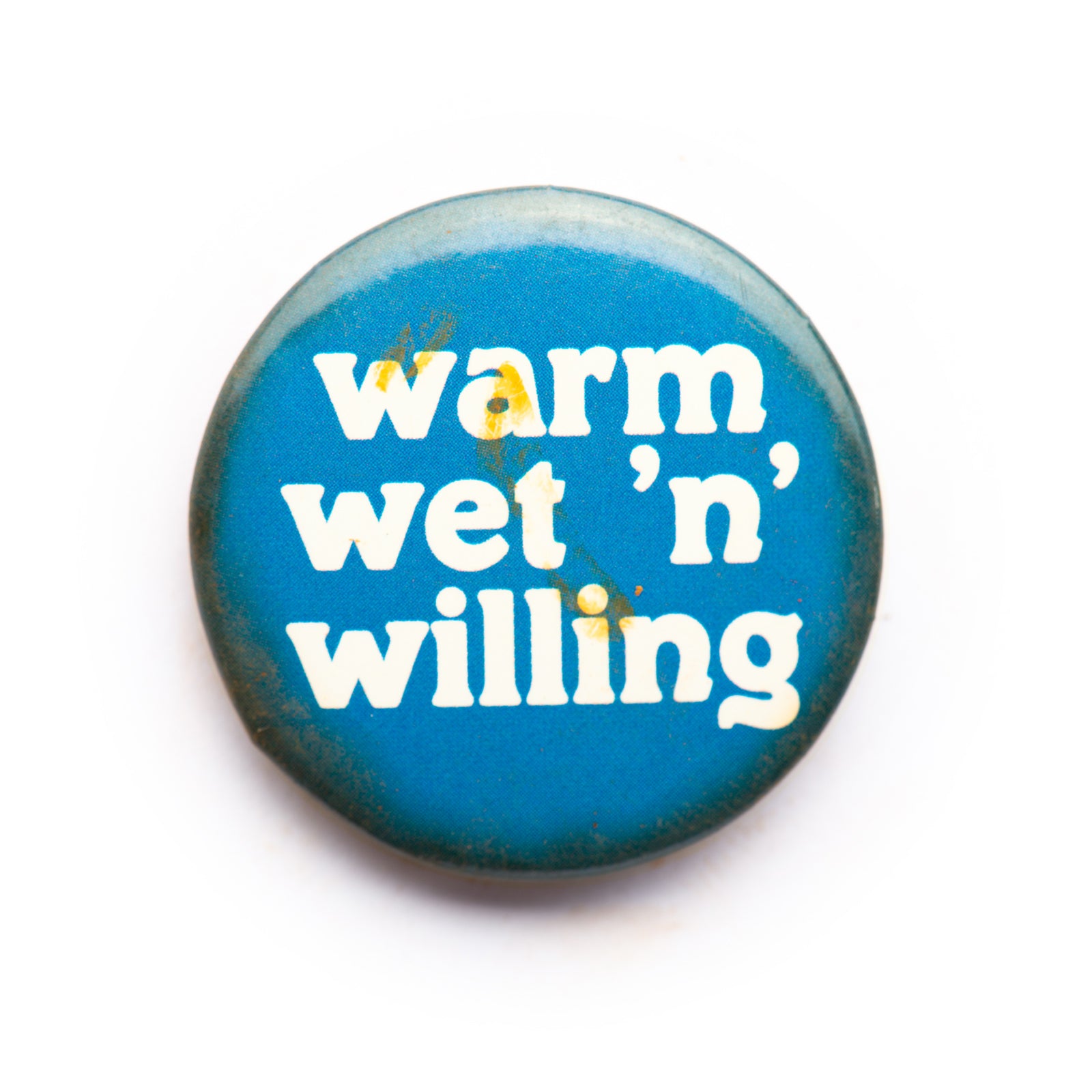 "Warm, Wet…" button pin